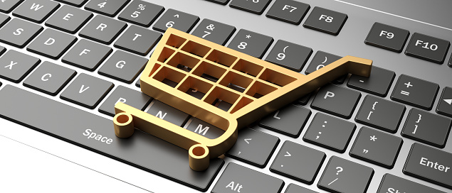 E shop, e commerce concept. Shopping cart trolley icon on a computer laptop. 3d illustration