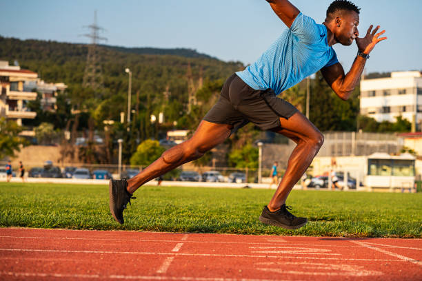istock Athlete Man Preparing And Runs Hurdles for Track and Field 1168965422