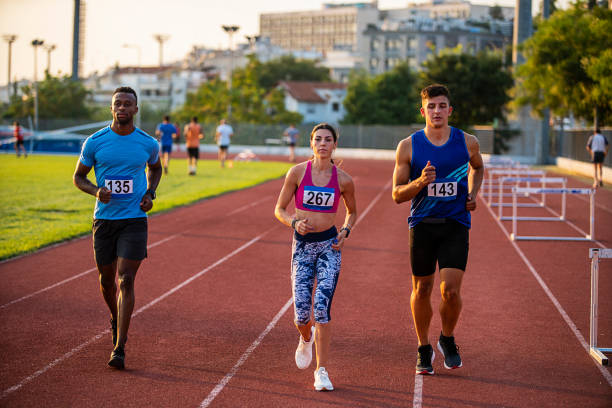 istock Athlete Men and Woman preparing and exercise for run 1168965439