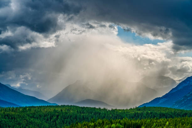 Fog shrouded mountains in Banff National Park in the Canadian Rockies