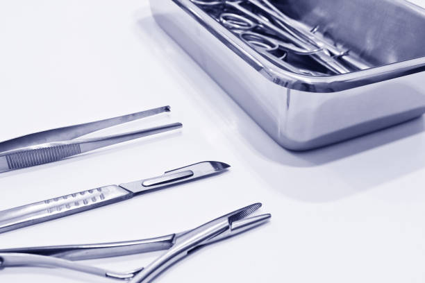 istock Surgical instruments isolated on the white background 1168971570