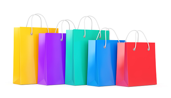 Group of five color paper shopping bags isolated on white background. Business, retail, sale and online commerce concept. 3D illustration