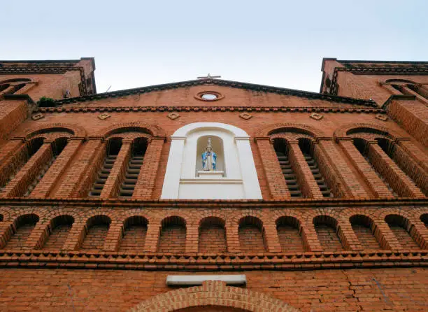 Bangui, Central African Republic: red brick facade of the Roman Catholic Cathedral of Our Lady of the Immaculate Conception - Cathédrale Notre-Dame-de-l'Immaculée-Conception de Bangui - French colonial architecture