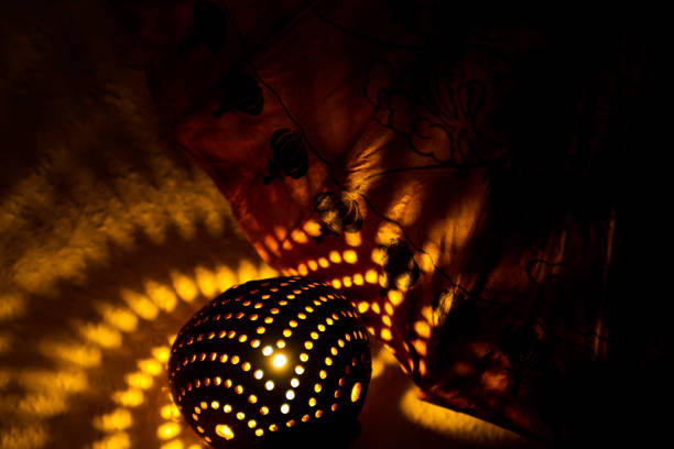 istock Bright shining coconut shell lamp in the night 1168978685