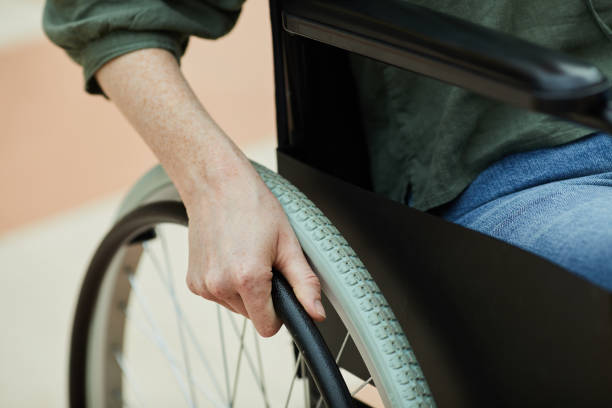 istock Young woman in wheelchair 1168978689