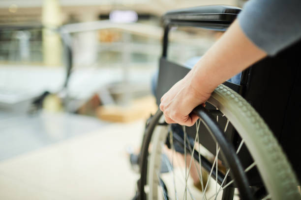 istock Disabled patient in wheelchair 1168979728