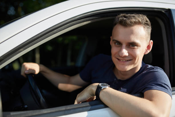 istock Happy young man with new car 1168979758