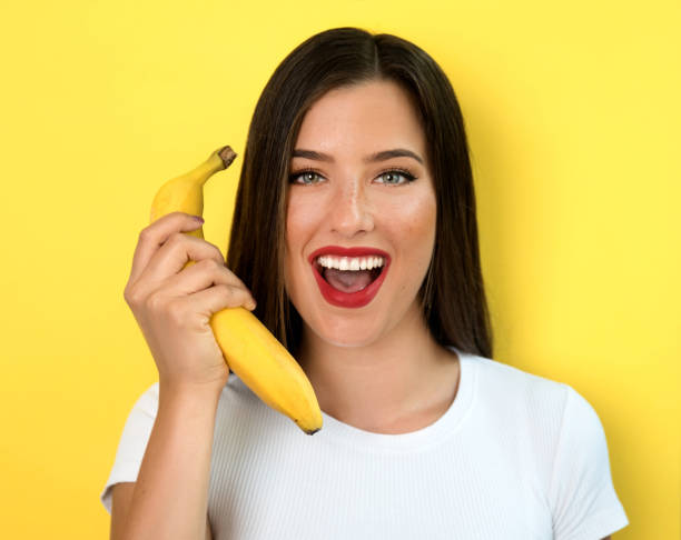 istock Woman with banana 1168981261