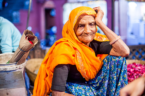 An elderly Indian woman vendor in Jaipur, India