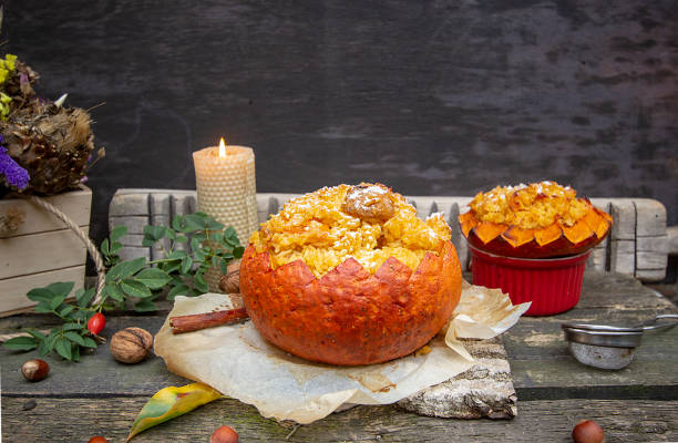 istock spiced orange risotto baked in pumpkin 1168981536