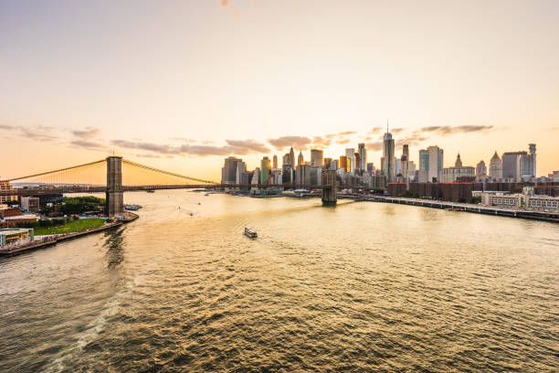 istock View of New York Skyline and Brooklyn Bridge during sunset 1168982919