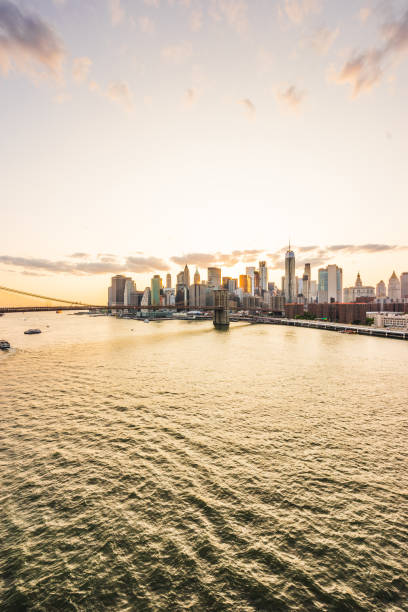 istock View of New York Skyline and Brooklyn Bridge during sunset 1168982929
