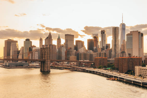 istock View of New York Skyline and Brooklyn Bridge during sunset 1168983565