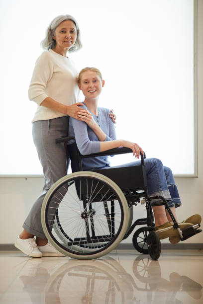 istock Mother care for her disabled daughter 1168983746