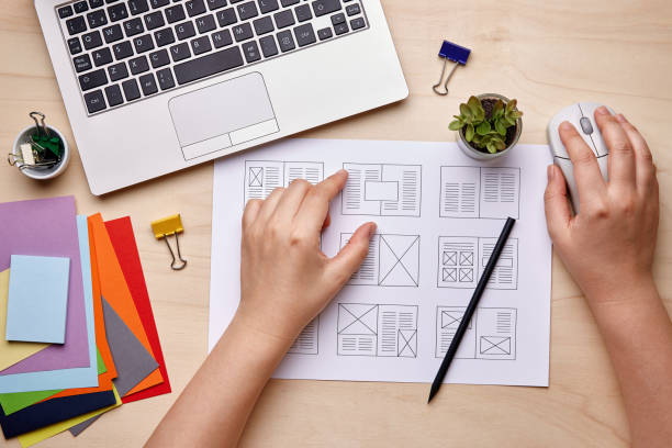 Editorial designer working on publication layout Editorial design. Graphic designer working on magazine layout designs. Flat lay editorial stock pictures, royalty-free photos & images