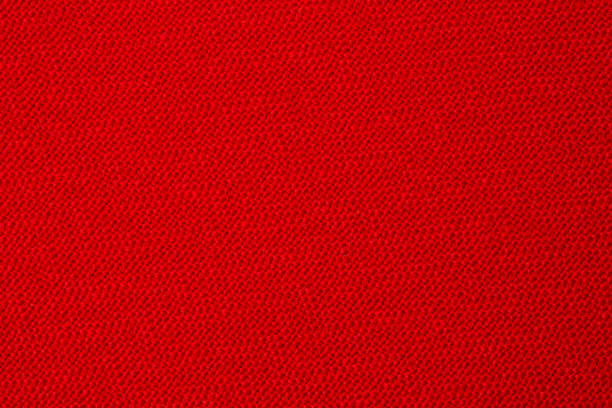 istock The texture of the red fabric as a background, backdrop close-up. View from above 1168986447