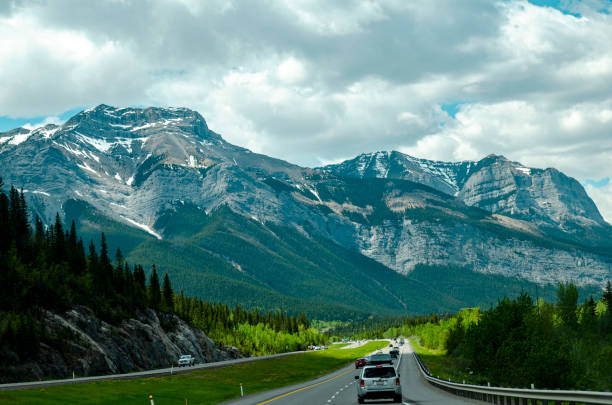 istock Journey on the way to Banff Alberta Canada with mountain in range 1168991561