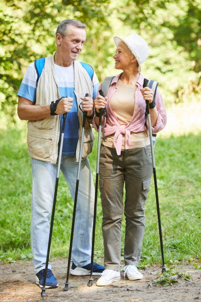 istock Senior couple doing nordic walking 1168991710