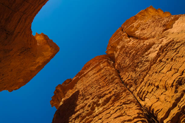 istock Bottom-up view to Abstract Rock formation at plateau Ennedi aka stone forest in Chad 1168993105