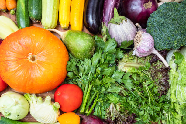 istock assortment of fresh vegetables on wooden table 1168994436