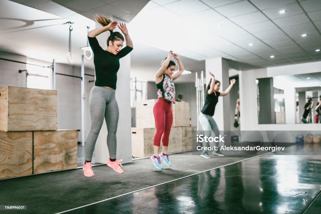 Jumping Jacks In Gym Jumping Stock Photo