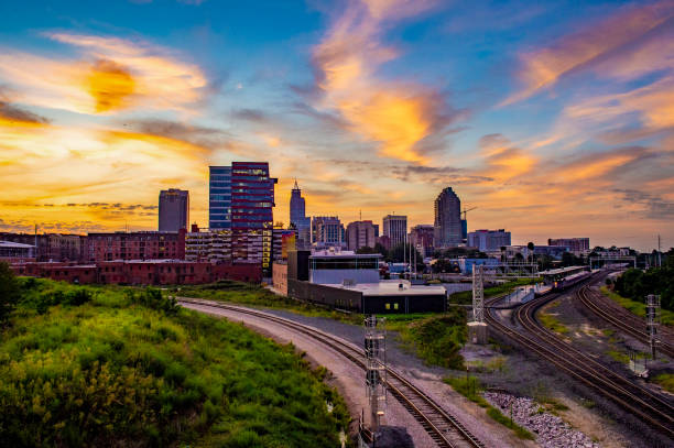 Raleigh NC Skyline Raleigh NC Skyline at sunrise from Boylan bridge raleigh north carolina stock pictures, royalty-free photos & images
