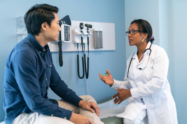 istock Korean man in consultation with doctor 1168996963