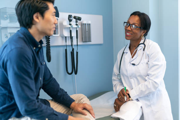 istock Korean man in consultation with doctor 1168996986