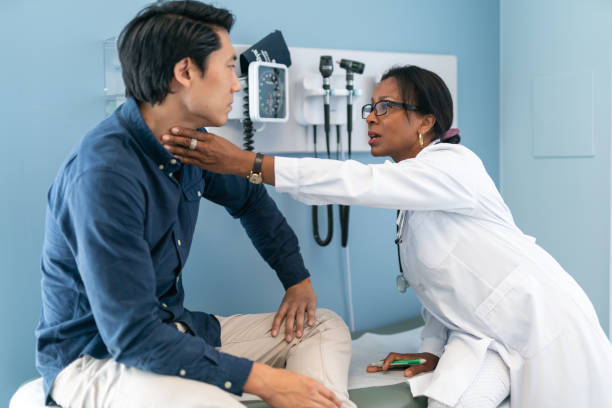 istock Korean man in consultation with doctor 1168996987