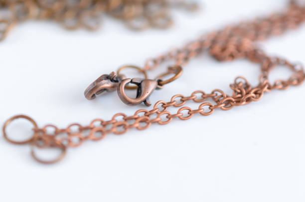 istock Copper chain with lobster clasp for handmade jewelry, craft concept . 1168998062