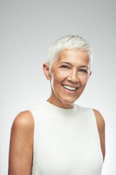 istock Woman posing in front of gray background. 1168998741