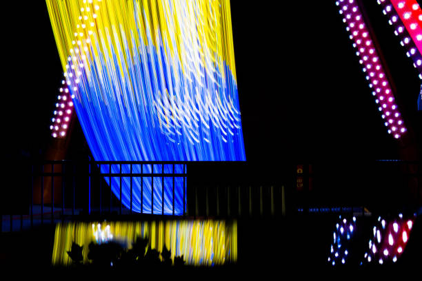 istock Amusement park neon lights long exposure 1168999577