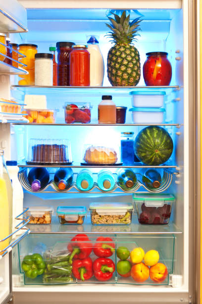 istock An Open Refrigerator Interior with Fresh Grocery Food Products 1168999831