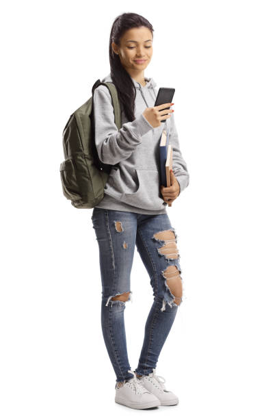 estudante fêmea novo na moda com livros e telefone móvel - text messaging mobile phone teenagers only people - fotografias e filmes do acervo