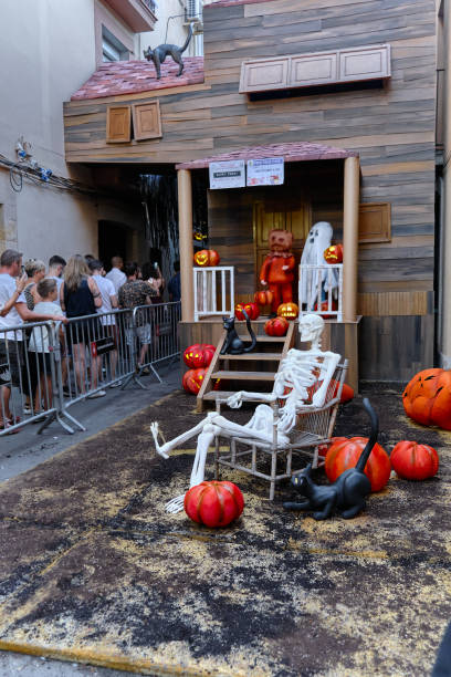 gracia festivities in barcelona, spain - child waiting in line in a row party imagens e fotografias de stock