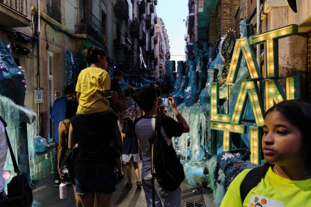 gracia festivities in barcelona, spain - child waiting in line in a row party imagens e fotografias de stock