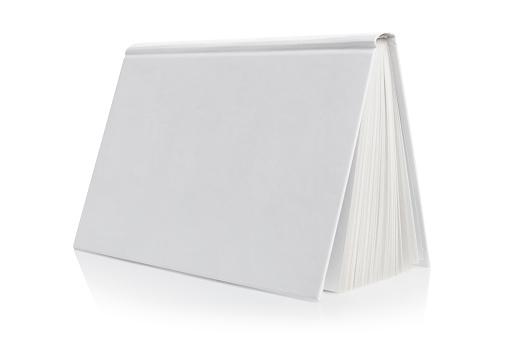 Libro de tapa dura blanco sobre blanco photo