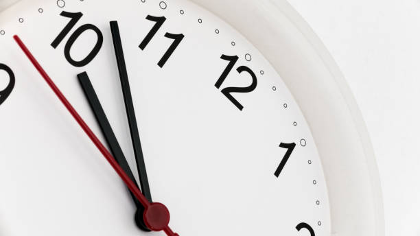 istock Closeup clock ticking showing ten hours 1169014154