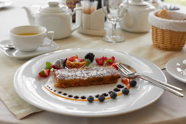 istock Delicious Apple pie exquisitely served with berries 1169014383