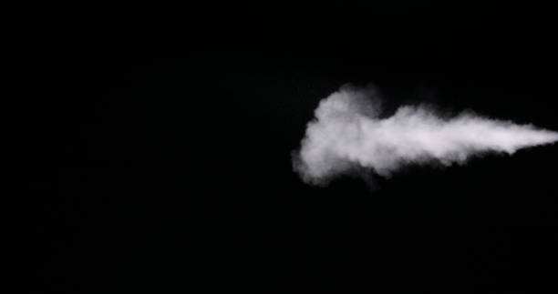 istock White Smoke Trail Isolated on Black Background 1169015135
