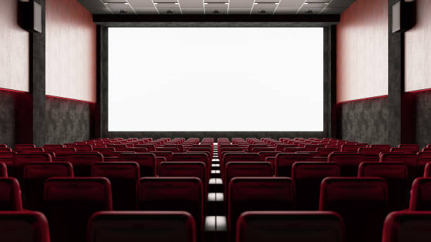 istock Empty Movie Theater with Red Seats and Blank Screen 1169016479