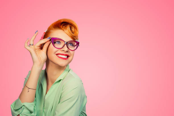 Headshot Attractive Young Woman holding Glasses laughing smiling happy stock photo