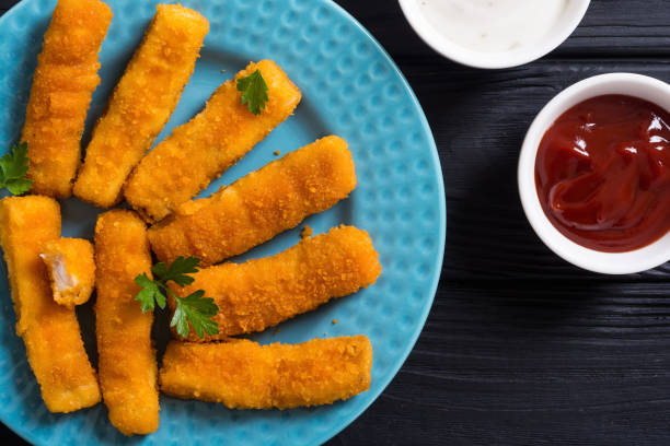 istock Fried fish sticks ( fingers ) or chicken nugget 1169017665