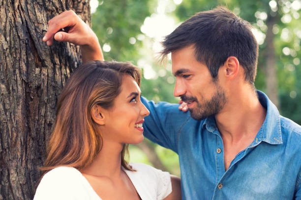 istock Young couple in the summer nature 1169017827