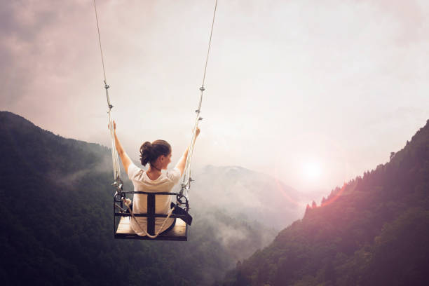 istock Female on Swing in the mountains. 1169022172
