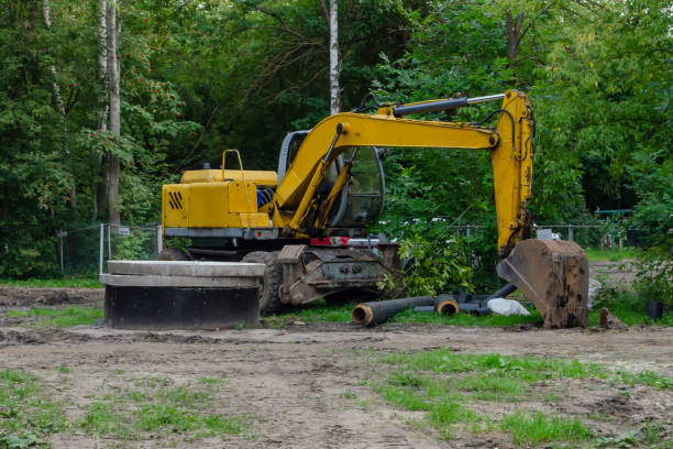 istock yellow Excavator machine standing with the pile 1169026042