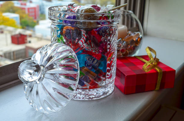 sweet gifts in a sweets jar - candy hard candy wrapped variation imagens e fotografias de stock