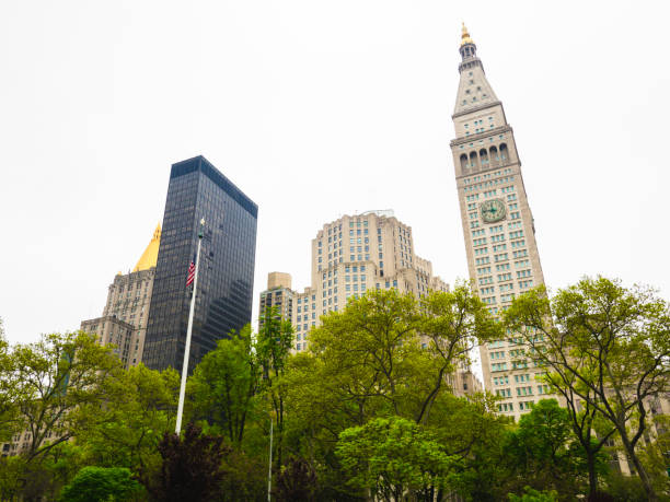 Flatiron District buildings behind Madison Square Park in New York City, USA