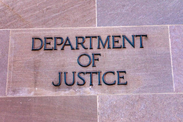 istock Sign  Justice Department Building Washington DC 1169029601