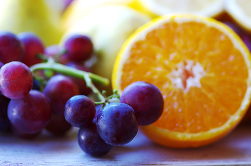 grapes and slices of orange fruit